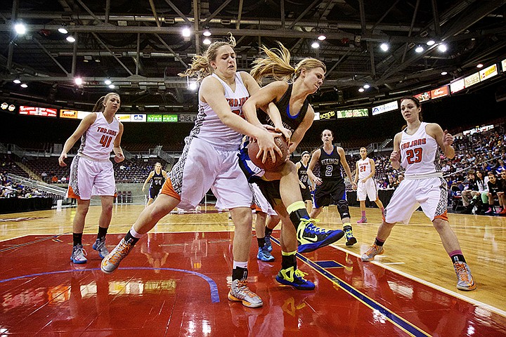 &lt;p&gt;JEROME A. POLLOS/Press Coeur d'Alene High's Madison Sumner, right, battles Hallie Gennett from Post Falls High for a rebound Saturday February, 17 during the first half of the Idaho 5A State championship game at the Idaho Center in Nampa.&lt;/p&gt;