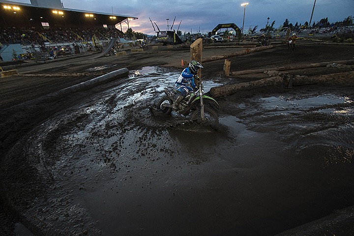 &lt;p&gt;GABE GREEN/Press First place finisher in the second pro-class race Taylor Robert of Scottsdale, Arizona rounds a sharp turn through a mud pit at the endurocross races Friday July, 12 at the Kootenai County Fairgrounds.&lt;/p&gt;