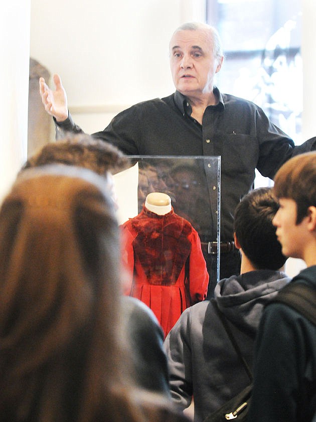 &lt;p&gt;&lt;strong&gt;The Museum at Central School&lt;/strong&gt; Director Gil Jordan speaks to a group of Bigfork eighth-graders about his favorite artifact at the museum, a red dress worn by Margaret Duffy on Christmas Eve in 1891. (Aaric Bryan/Daily Inter Lake)&lt;/p&gt;