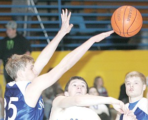 &lt;p&gt;Libby&#146;s senior guard Will Reichel has his shot tipped away by Jared Trinastich in first-quarter action vs. Columbia Falls Saturday evening.&#160;&lt;/p&gt;