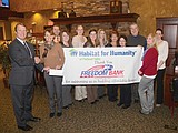 Freedom Bank donates to Habitat project