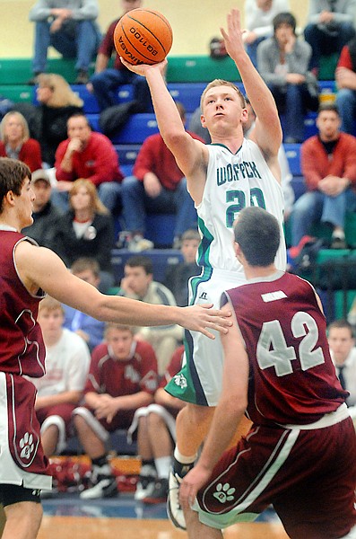 Glacier senior Colter Hanson, 20, shoots for two during the first half of the game against Helena High on Friday night.