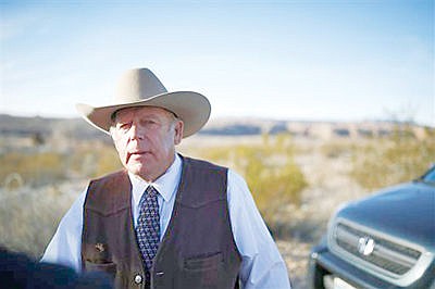 &lt;p&gt;Rancher Cliven Bundy stands along the road near his ranch after speaking with media Wednesday, Jan. 27, 2016, in Bunkerville, Nev. Cliven Bundy and his wife Carol Bundy was returning from a trip to visit the family of LaVoy Finicum, a 55-year-old rancher from Cain Beds, Ariz., who died Tuesday after law enforcement officers initiated a traffic stop near the Malheur National Wildlife Refuge. It's unclear what happened in the moments before his death. (AP Photo/John Locher)&lt;/p&gt;