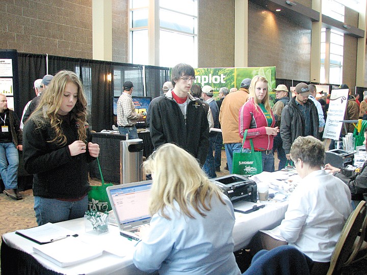 FFA students from Cove High School, in Cove, Ore., register at the Washington-Oregon Potato Conference this week, in Kennewick.