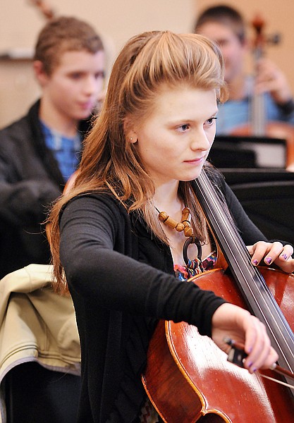 Quin Stevens, a senior, practices with the orchestra on Tuesday afternoon at Glacier High School. Stevens is one of the students who will be taking part in the Evening of Fine Arts on Feb. 3, in the Community Room of the Arts and Technology building at Flathead Valley Community College.