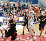 Cats split the bill, get key conference win