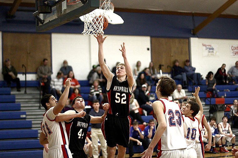 <p>Pavlo Zahora fires off a shot from down low in Superior on Saturday. The Savage Heat were defeated by the Bobcats, 51-67.</p>