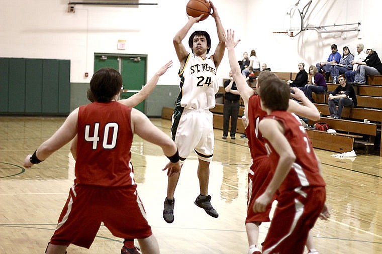 &lt;p&gt;St. Regis sophomore Andrew Managhan elevates to hit a perimeter shot during Friday's home game.&lt;/p&gt;