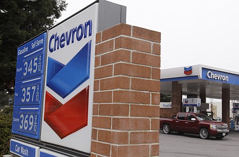 &lt;p&gt;A sign advertises gasoline prices at a Chevron gas station in Mountain View, Calif., Friday. Chevron Corp. said Friday its fourth-quarter net income jumped 72 percnt as rising fuel demand lifted oil prices and produced a sharp turnaround in its refinery business.&lt;/p&gt;