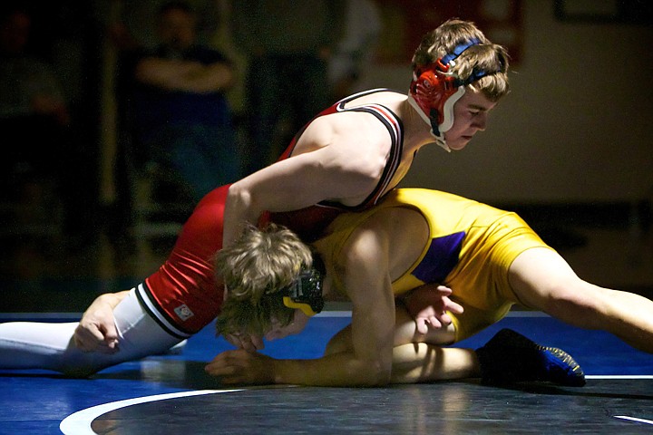 &lt;p&gt;Sandpoint High's Payton Dillon keeps the pressure on his opponent Tristen O'Brien from Kellogg High during the 112-pound championship match.&lt;/p&gt;