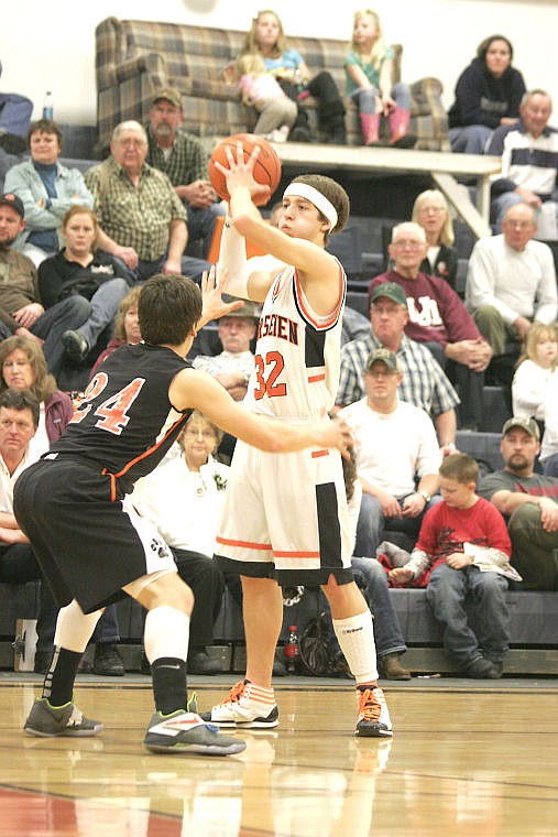 &lt;p&gt;Senior Dallas Burgess keeps the ball from a Eureka player at Saturday night's game at home.&lt;/p&gt;