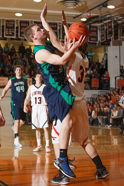 &lt;p&gt;Glacier senior guard Matt Peters (32) puts up a shot past Flathead junior Bodie Chieffer (33) Tuesday night during the crosstown matchup at Flathead High School. Tuesday, Jan. 29, 2013 in Kalispell, Montana. (Patrick Cote/Daily Inter Lake)&lt;/p&gt;