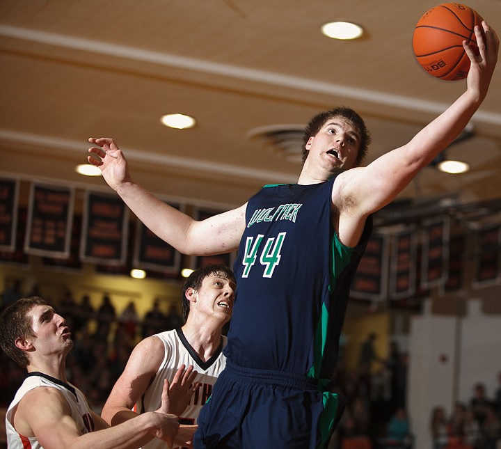 &lt;p&gt;Glacier senior post Ryan Edwards (44) grabs a rebound Tuesday night during the crosstown matchup at Flathead High School. Tuesday, Jan. 29, 2013 in Kalispell, Montana. (Patrick Cote/Daily Inter Lake)&lt;/p&gt;