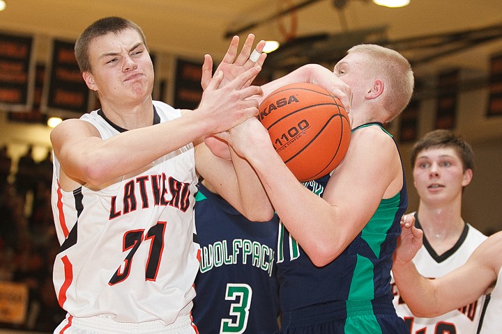 &lt;p&gt;Glacier senior guard Matt Peters (32) and Flathead junior Matt Quist (31) battle for the ball Tuesday night during the crosstown matchup at Flathead High School. Tuesday, Jan. 29, 2013 in Kalispell, Montana. (Patrick Cote/Daily Inter Lake)&lt;/p&gt;