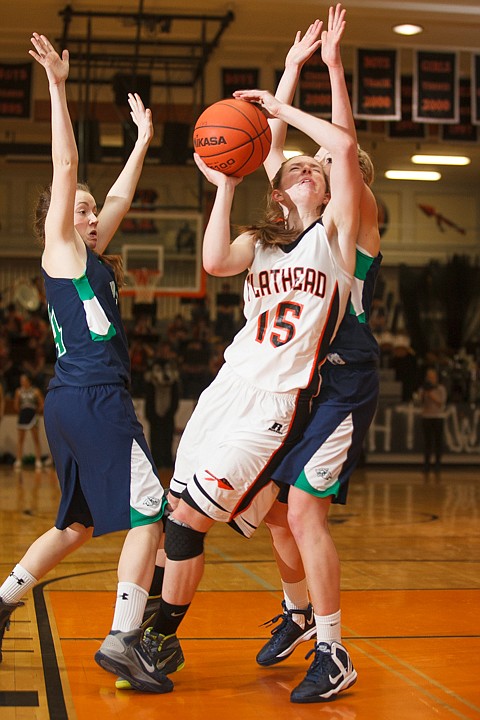 &lt;p&gt;Flathead senior Emily Russell (15) puts up a shot Tuesday night during the crosstown matchup at Flathead High School. Tuesday, Jan. 29, 2013 in Kalispell, Montana. (Patrick Cote/Daily Inter Lake)&lt;/p&gt;