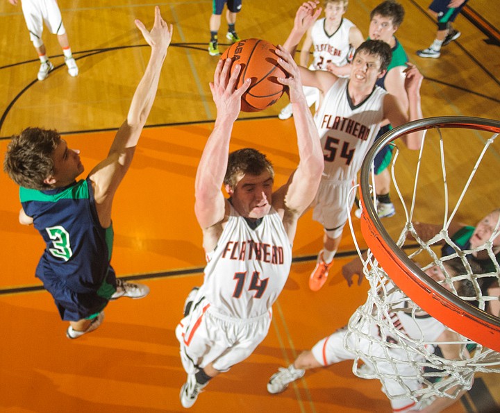 &lt;p&gt;Glacier senior Reid Siderius (3) swats at Flathead senior Matt Tokarz (14) as grabs a rebound Tuesday night during the crosstown matchup at Flathead High School. Tuesday, Jan. 29, 2013 in Kalispell, Montana. (Patrick Cote/Daily Inter Lake)&lt;/p&gt;