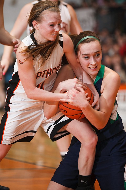 &lt;p&gt;Flathead senior Sani Davis (left) and Glacier senior Rachel Chery (right) battle for a ball Tuesday night during the crosstown matchup at Flathead High School. Tuesday, Jan. 29, 2013 in Kalispell, Montana. (Patrick Cote/Daily Inter Lake)&lt;/p&gt;