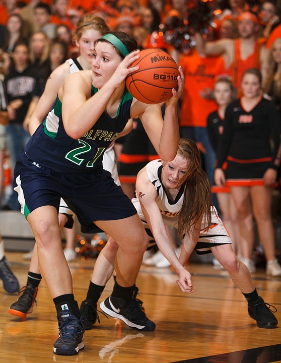 &lt;p&gt;Glacier junior Cassidy Hashley (21) grabs a loose ball Tuesday night during the crosstown matchup at Flathead High School. Tuesday, Jan. 29, 2013 in Kalispell, Montana. (Patrick Cote/Daily Inter Lake)&lt;/p&gt;