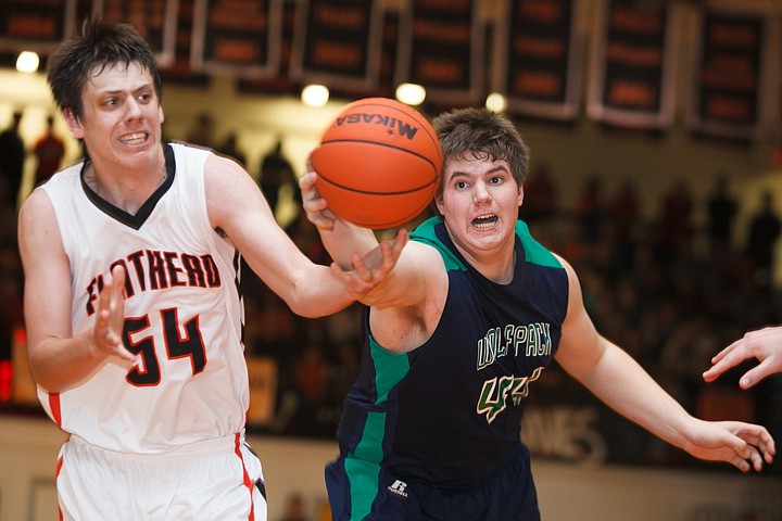 &lt;p&gt;Glacier senior Ryan Edwards (44) snags a loose ball from Flathead senior Garth West (54) Tuesday night during the crosstown matchup at Flathead High School. Tuesday, Jan. 29, 2013 in Kalispell, Montana. (Patrick Cote/Daily Inter Lake)&lt;/p&gt;