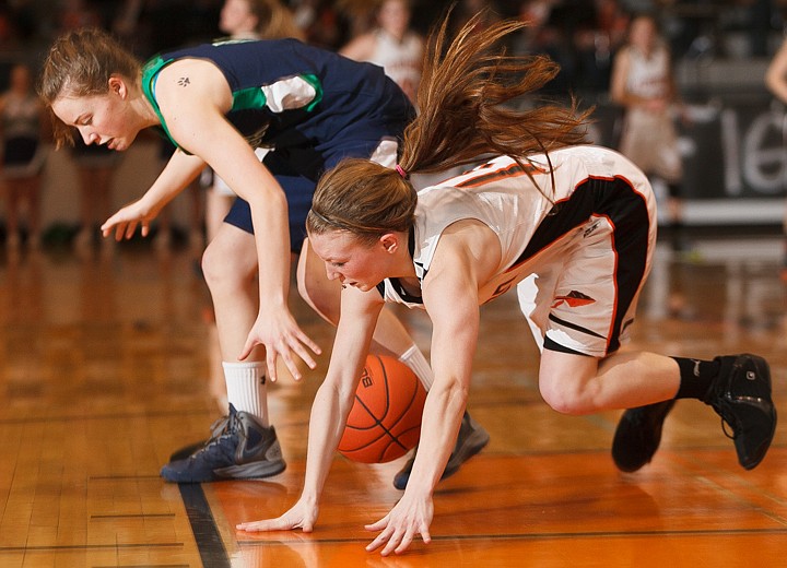 &lt;p&gt;Players collide Tuesday night during the crosstown matchup at Flathead High School. Tuesday, Jan. 29, 2013 in Kalispell, Montana. (Patrick Cote/Daily Inter Lake)&lt;/p&gt;