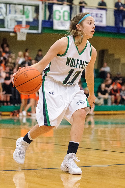 &lt;p&gt;Glacier freshman guard McKenna Hulslander brings the ball up the court Thursday night during the second half of Glacier's crosstown victory over Flathead at Glacier High School. Jan. 30, 2014 in Kalispell, Montana. (Patrick Cote/Daily Inter Lake)&lt;/p&gt;