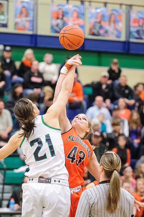 &lt;p&gt;Glacier senior center Cassi Hashley (21) and Flathead senior Jenessa Heine (43) fight for the tip Thursday night during the crosstown basketball matchup at Glacier High School. Jan. 30, 2014 in Kalispell, Montana. (Patrick Cote/Daily Inter Lake)&lt;/p&gt;