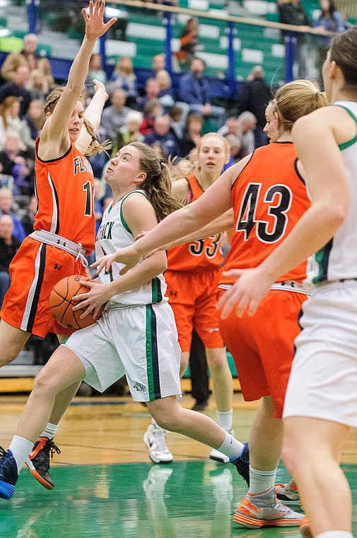 &lt;p&gt;Glacier sophomore guard Hailee Bennett (4) drives the lane Thursday night during the crosstown basketball matchup at Glacier High School. Jan. 30, 2014 in Kalispell, Montana. (Patrick Cote/Daily Inter Lake)&lt;/p&gt;