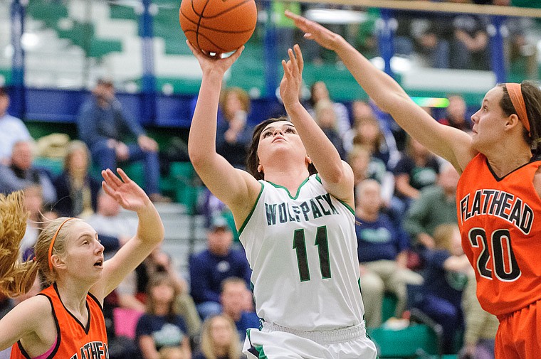 &lt;p&gt;Glacier junior guard Taylor Loomis (11) puts up a shot Thursday night during the crosstown basketball matchup at Glacier High School. Jan. 30, 2014 in Kalispell, Montana. (Patrick Cote/Daily Inter Lake)&lt;/p&gt;