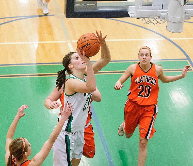 &lt;p&gt;Glacier senior center Cassi Hashley (21) puts up a shot Thursday night during the second half of Glacier's crosstown victory over Flathead at Glacier High School. Jan. 30, 2014 in Kalispell, Montana. (Patrick Cote/Daily Inter Lake)&lt;/p&gt;