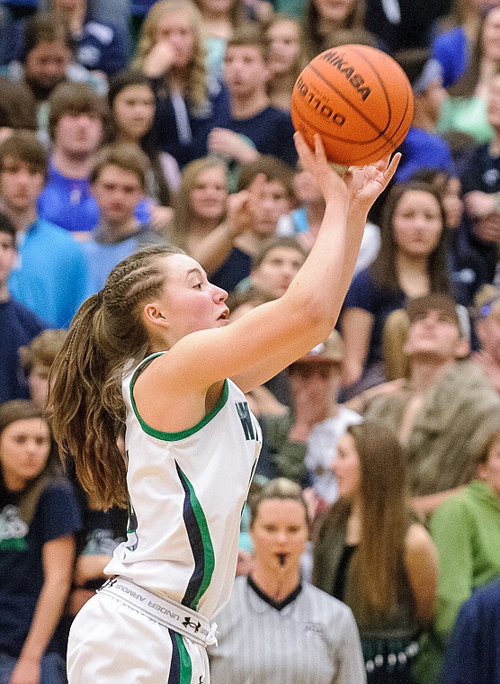 &lt;p&gt;Glacier sophomore guard Hailee Bennett shoots a three-point shot Thursday night during the second half of Glacier's crosstown victory over Flathead at Glacier High School. Jan. 30, 2014 in Kalispell, Montana. (Patrick Cote/Daily Inter Lake)&lt;/p&gt;