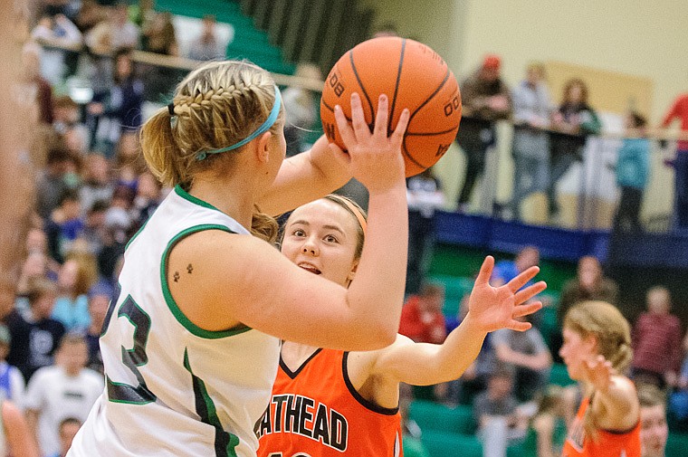 &lt;p&gt;Flathead sophomore Stephanie Wilson (12) guards Glacier sophomore guard Katie Thomas (23) Thursday night during the second half of Glacier's crosstown victory over Flathead at Glacier High School. Jan. 30, 2014 in Kalispell, Montana. (Patrick Cote/Daily Inter Lake)&lt;/p&gt;