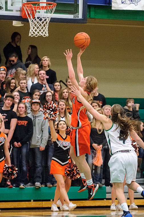 &lt;p&gt;Flathead senior Emma Andrews (10) puts up a shot on a break away Thursday night during the second half of Glacier's crosstown victory over Flathead at Glacier High School. Jan. 30, 2014 in Kalispell, Montana. (Patrick Cote/Daily Inter Lake)&lt;/p&gt;