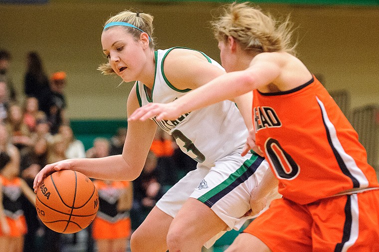 &lt;p&gt;Glacier sophomore forward Taylor Salonen (3) tries to drive around Flathead senior Emma Andrews (10) Thursday night during the second half of Glacier's crosstown victory over Flathead at Glacier High School. Jan. 30, 2014 in Kalispell, Montana. (Patrick Cote/Daily Inter Lake)&lt;/p&gt;