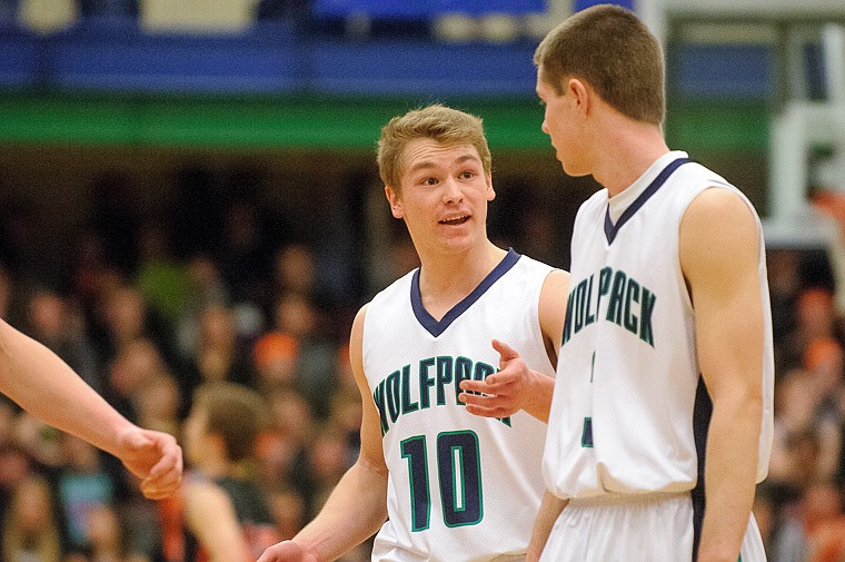 &lt;p&gt;Glacier senior guard Evan Epperly (10) gives advice to Glacier junior wing Sam McCamley (3) Thursday night during the first half of the crosstown matchup between Glacier and Flathead at Glacier High School. Jan. 30, 2014 in Kalispell, Montana. (Patrick Cote/Daily Inter Lake)&lt;/p&gt;