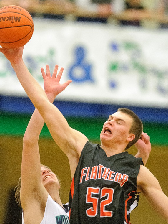 &lt;p&gt;Flathead senior Matt Quist (52) battles for tip Thursday night during the first half of the crosstown matchup between Glacier and Flathead at Glacier High School. Jan. 30, 2014 in Kalispell, Montana. (Patrick Cote/Daily Inter Lake)&lt;/p&gt;