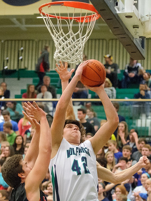 &lt;p&gt;Glacier junior post Truman Pisk (42) puts up a shot Thursday night during the second half of Glacier's crosstown victory over Flathead at Glacier High School. Jan. 30, 2014 in Kalispell, Montana. (Patrick Cote/Daily Inter Lake)&lt;/p&gt;