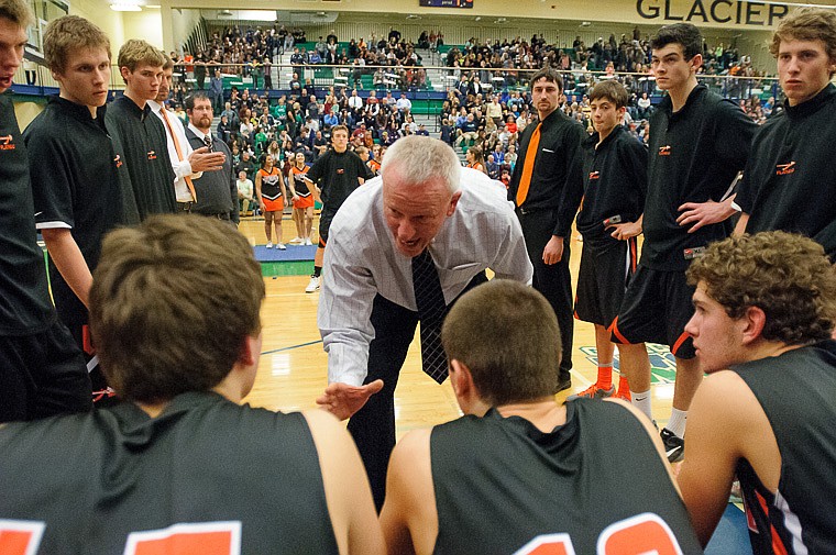 &lt;p&gt;Flathead head coach Fred Febach talks to his team Thursday night before the start of the first half of the crosstown matchup between Glacier and Flathead at Glacier High School. Jan. 30, 2014 in Kalispell, Montana. (Patrick Cote/Daily Inter Lake)&lt;/p&gt;