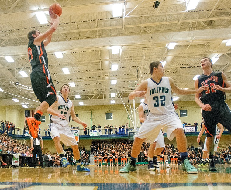 &lt;p&gt;Flathead senior Chandler Escalante (23) shoots Thursday night during the first half of the crosstown matchup between Glacier and Flathead at Glacier High School. Jan. 30, 2014 in Kalispell, Montana. (Patrick Cote/Daily Inter Lake)&lt;/p&gt;