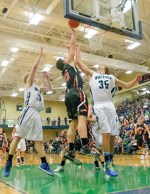 &lt;p&gt;Flathead senior Adam Bradley (45) puts up a shot Thursday night during the first half of the crosstown matchup between Glacier and Flathead at Glacier High School. Jan. 30, 2014 in Kalispell, Montana. (Patrick Cote/Daily Inter Lake)&lt;/p&gt;