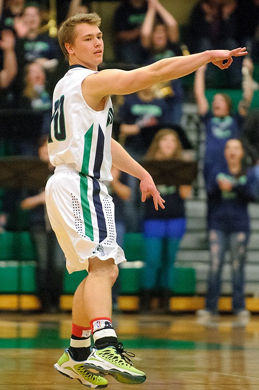 &lt;p&gt;Glacier senior guard Evan Epperly (10) signs a three after a made basket Thursday night during the first half of the crosstown matchup between Glacier and Flathead at Glacier High School. Jan. 30, 2014 in Kalispell, Montana. (Patrick Cote/Daily Inter Lake)&lt;/p&gt;