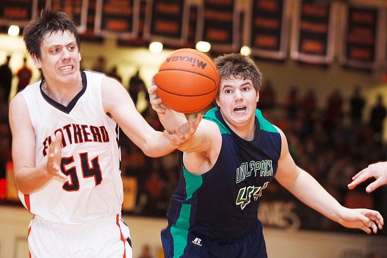 &lt;p&gt;Glacier senior Ryan Edwards (44) snags a loose ball from Flathead senior Garth West (54) Tuesday night during the crosstown basketball game at Flathead High School.&#160;&lt;/p&gt;