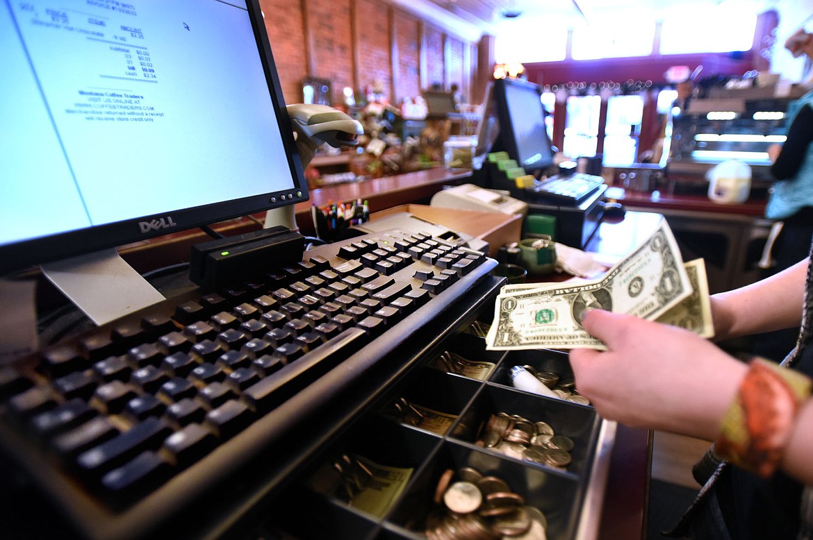 &lt;p&gt;Bryce Swanson, 18, of Whitefish, makes change for a customer at Montana Coffee Traders in downtown Whitefish on Thursday morning, January 14. (Brenda Ahearn/Daily Inter Lake)&lt;/p&gt;