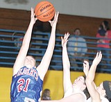 Girls win two on the road