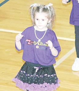 &lt;p&gt;Zumba girl, Emily Harmon, 4, showed everyone her moves Friday as dozens of the half-pint dancers performed during halftime of the Libby-Troy matchup.&lt;/p&gt;