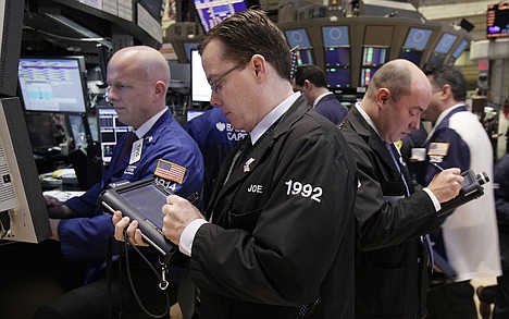 &lt;p&gt;Traders work on the floor of the New York Stock Exchange Monday, Jan. 30, 2012. Uncertainty about a deal between Greece and its creditors to ease its debt burden is weighing on investor sentiment. (AP Photo/Richard Drew)&lt;/p&gt;