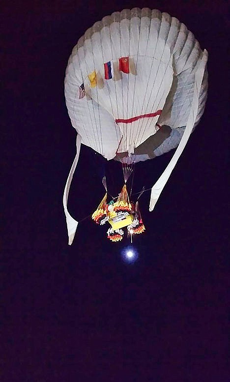 <p>In this photo provided by the Two Eagles Balloon Team, Troy Bradley of New Mexico and Leonid Tiukhtyaev of Russia set off from Saga, Japan, shortly before 6:30 a.m. JST Sunday, Jan. 25, in their quest to pilot their helium-filled balloon from Japan to North America and break two major records en route.</p>