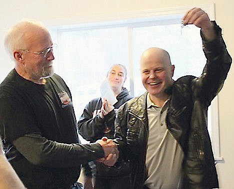 &lt;p&gt;New Habitat for Humanity homeowner Sean Blankenship shows off his keys after he received them in December for his Coeur d'Alene home. On the left is Greg Nowak, Habitat construction director, and in the middle is Kjierstin Thweatt, Habitat volunteer.&lt;/p&gt;