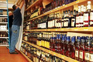 &lt;p&gt;Bob Kennedy and Josh Edlun put the finishing touches on the shelves at the Idaho Liquor Store&#146;s new Ponderay location. (Photo by CAMERON RASMUSSON)&lt;/p&gt;