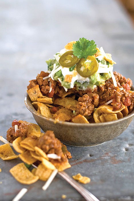 &lt;p&gt;This Jan. 4, 2012 photo shows Elizabeth Karmel's recipe for a walking taco served in a bowl in Concord, N.H. A make-your-own taco bar is dramatic, and is easy on the cook. (AP Photo/Matthew Mead)&lt;/p&gt;