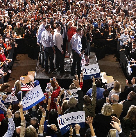 &lt;p&gt;Republican presidential candidate, former Massachusetts Gov. Mitt Romney, waves to supporters with his wife Ann and family at his Florida primary primary night rally in Tampa, Fla., Tuesday, Jan. 31, 2012. (AP Photo/Gerald Herbert)&lt;/p&gt;